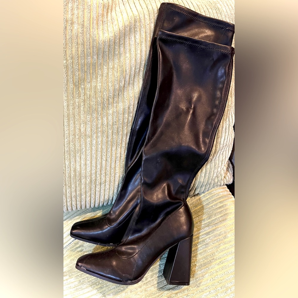 Tall black boots